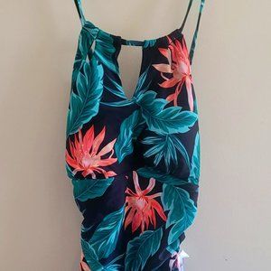 Women's one piece tropical design bathing suit.